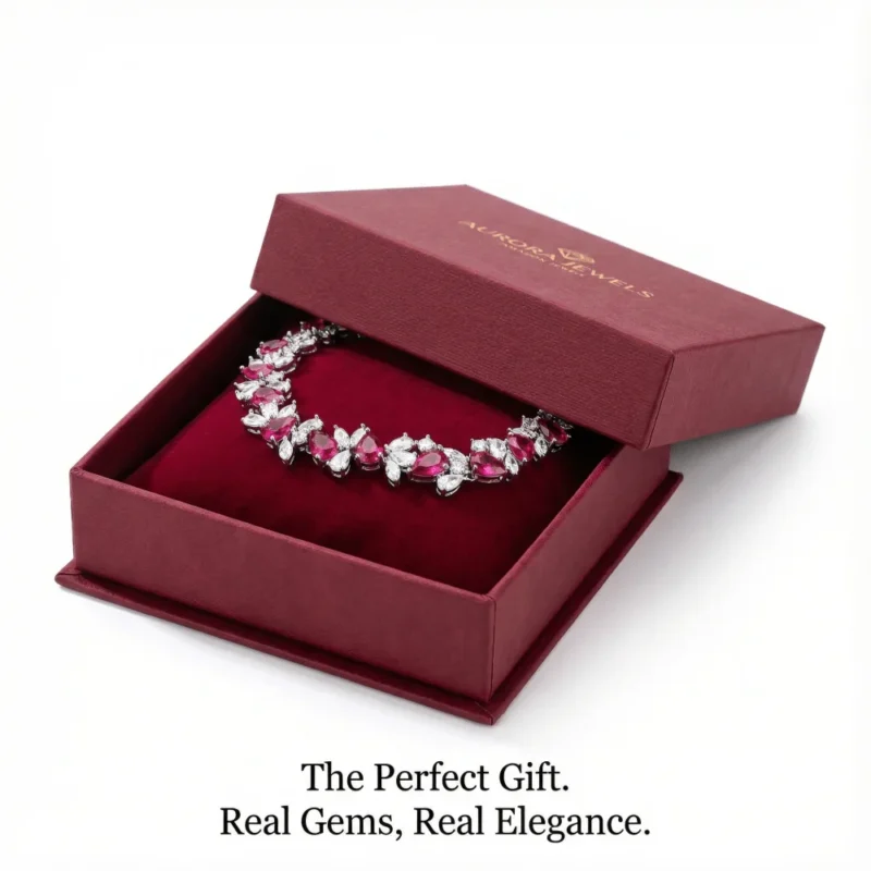 This is a light luxury 925 silver bracelet with synthetic rubies as the central stone