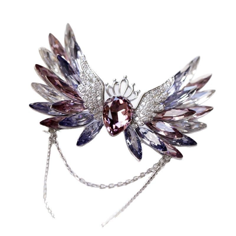 New crystal wing and tassel crown design brooch